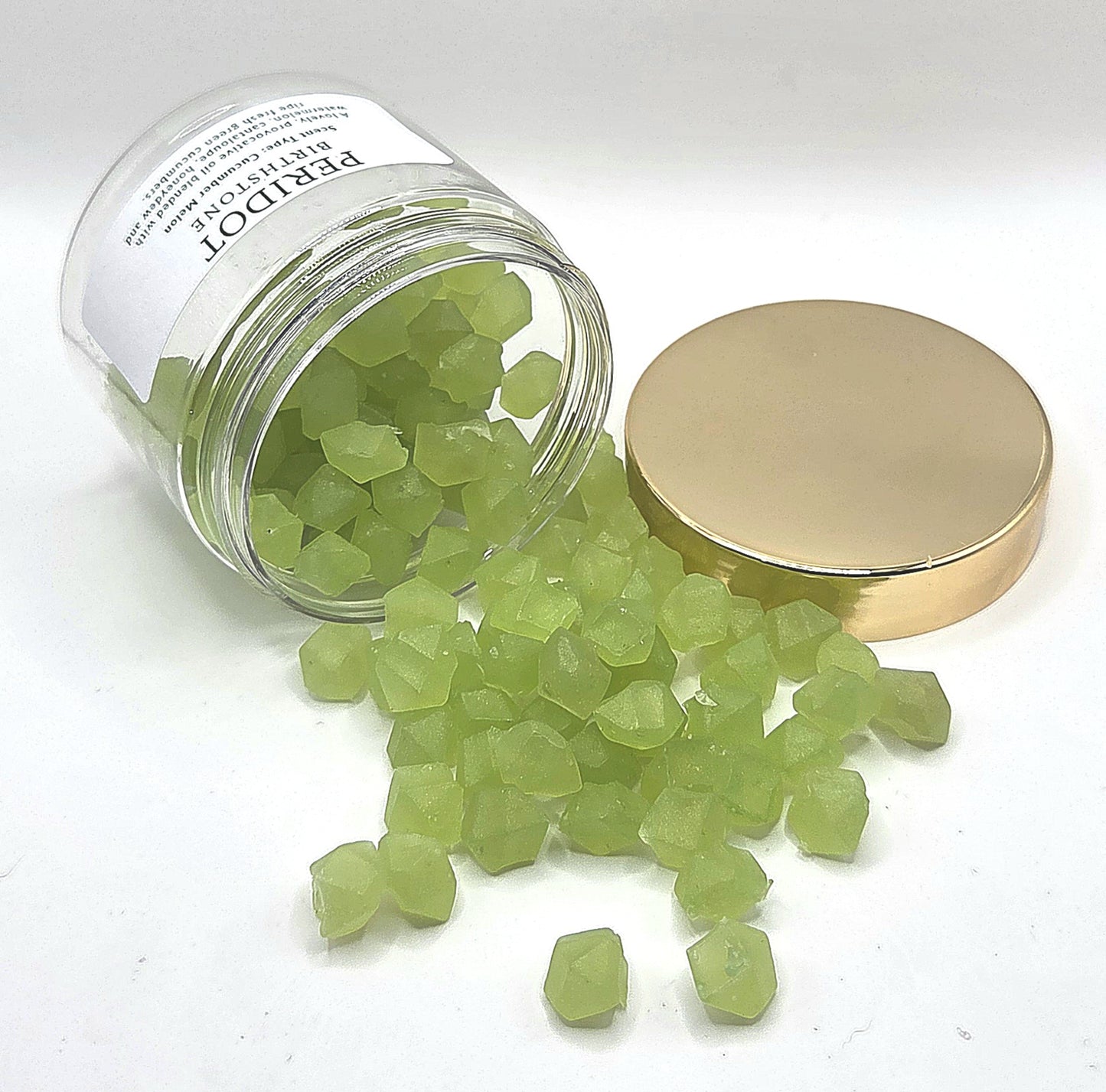 peridot wax melts spilling out of jar