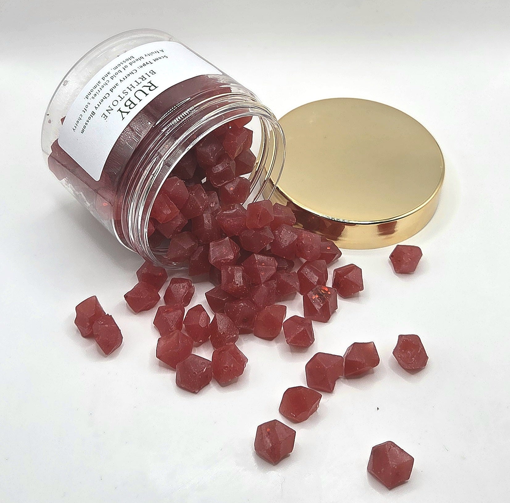 ruby wax melts spilling from jar