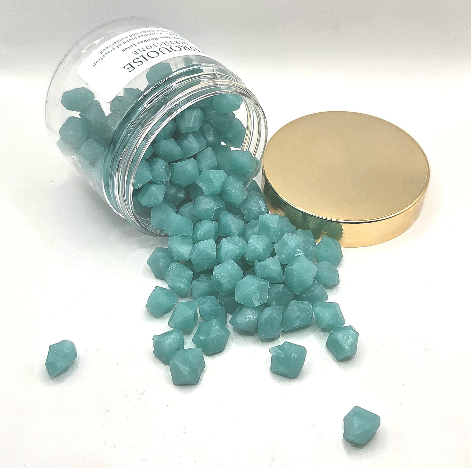 turquoise wax melts spilling out of jar