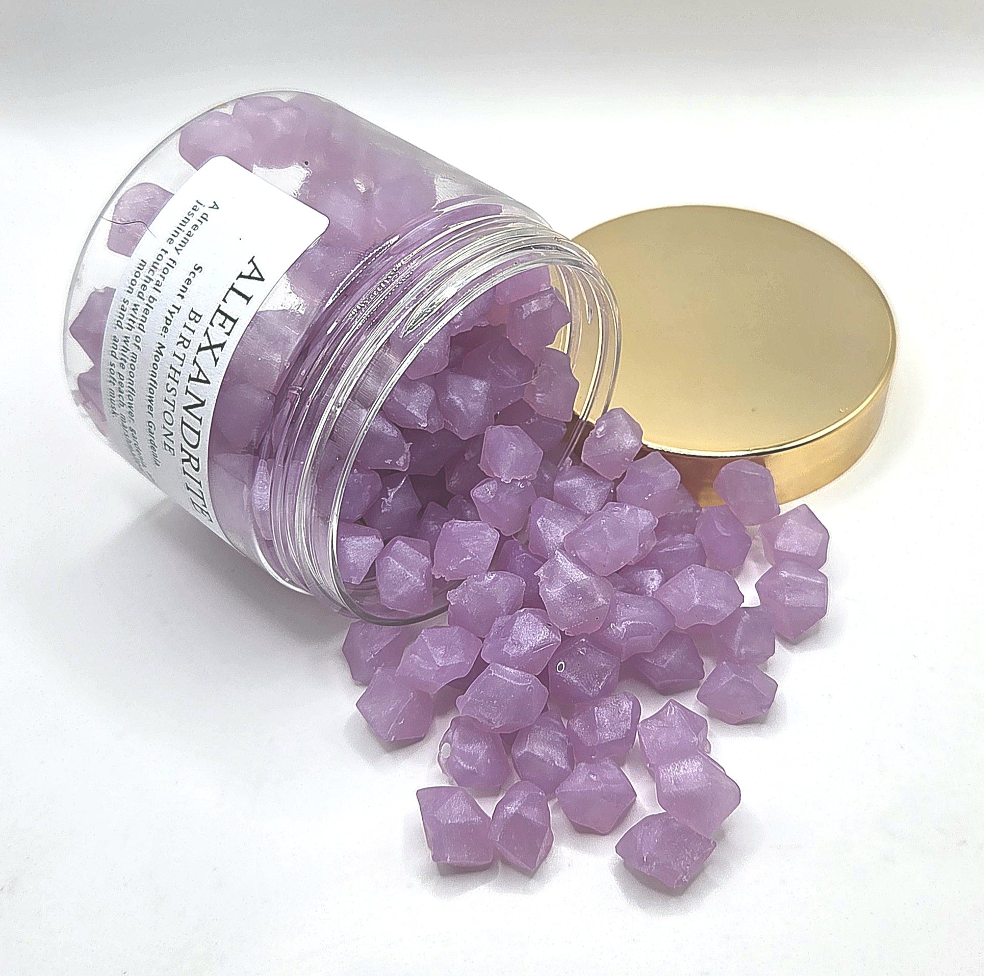 Alexandrite Wax Melts spilling out of jar