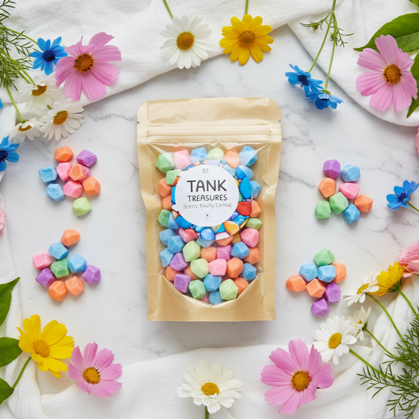 Fish tank pebbles wax melts lifestyle with colorful florals - fruity cereal scent - playful home decor