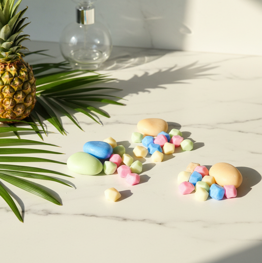 Pastel pebbles tropical wax melts lifestyle flatlay - vacation vibes - cottagecore